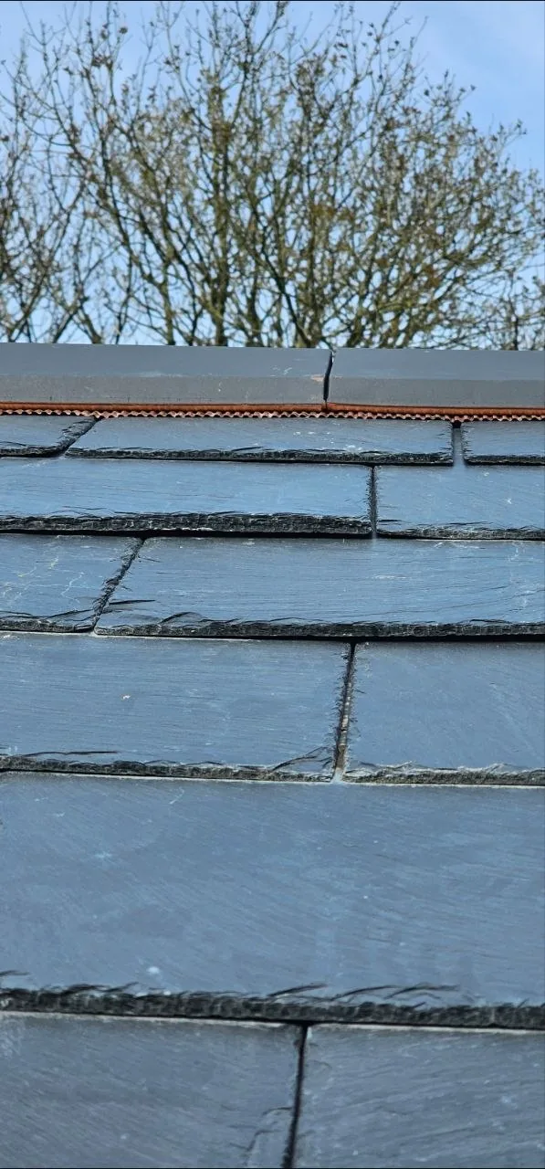 Close up of natural slate courses and ridge