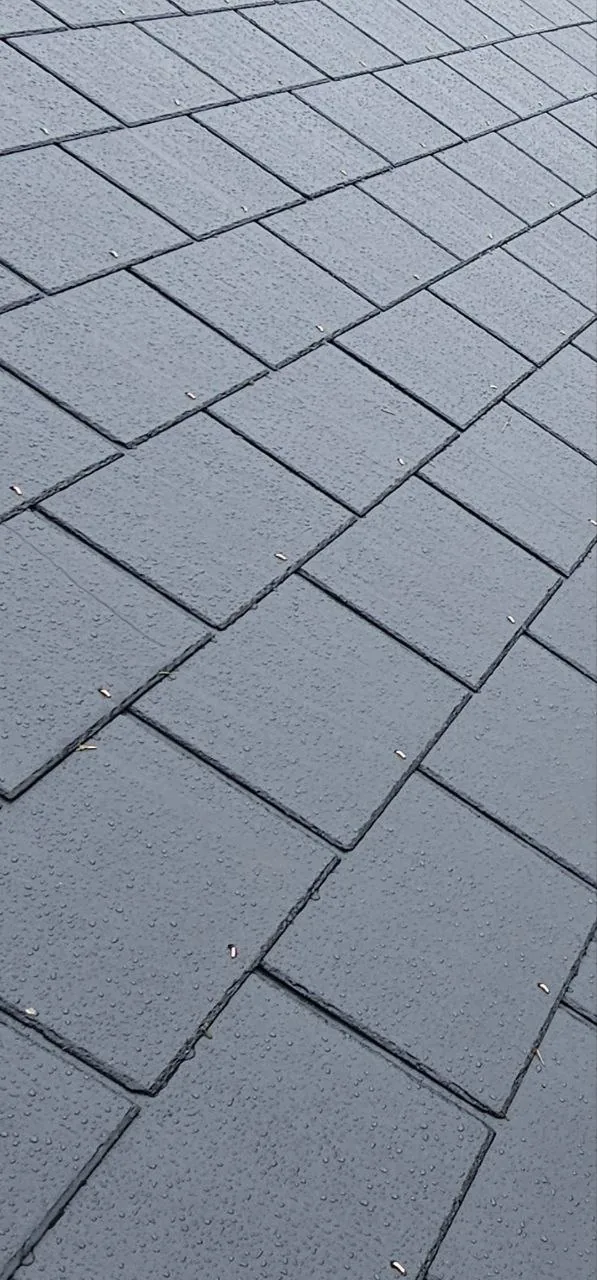 Fibre cement slates laid in even courses