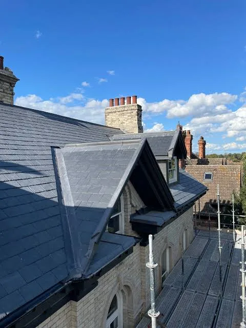 New dormer roof slated and leaded