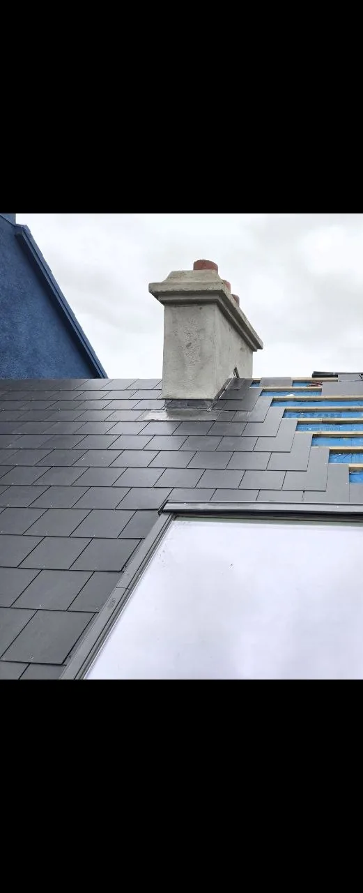 Roof stripped and re-slated around a chimney