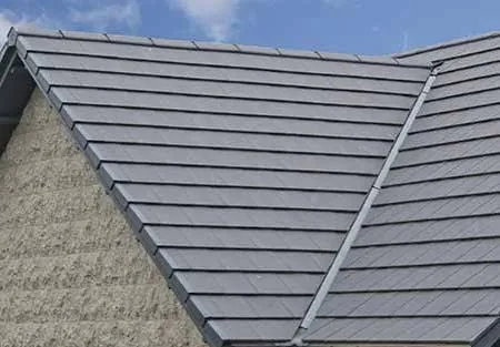 Concrete tile roof after cleaning and coating
