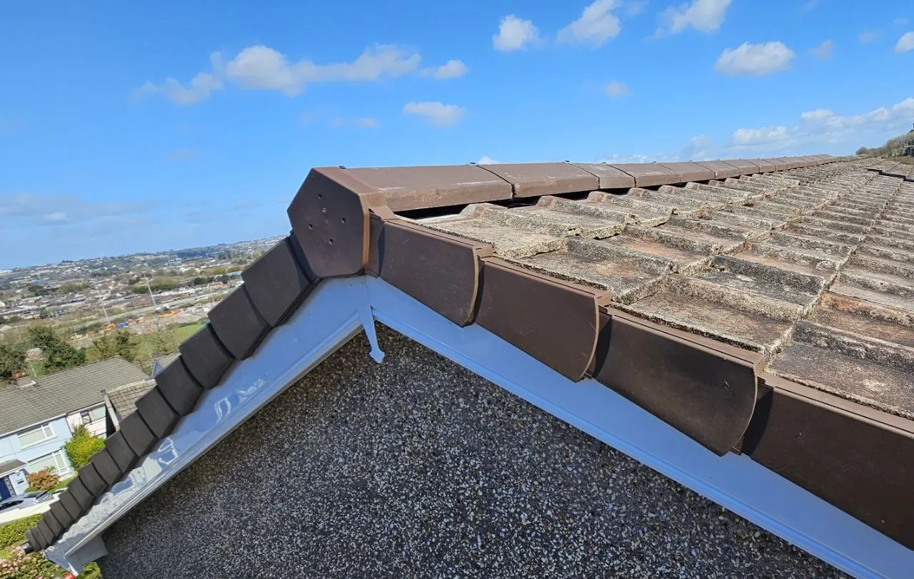 New verge tiles and gutter along a repaired roof edge