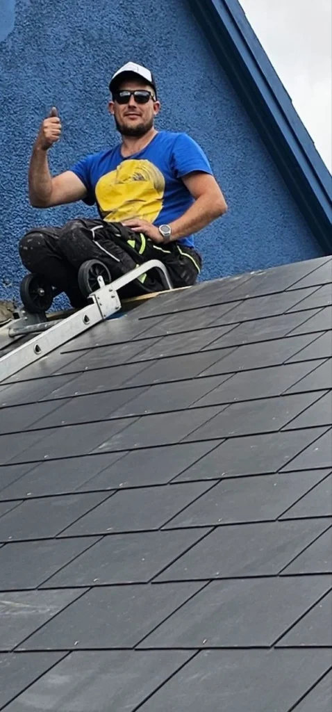 Alex Altytsia on a finished slate roof